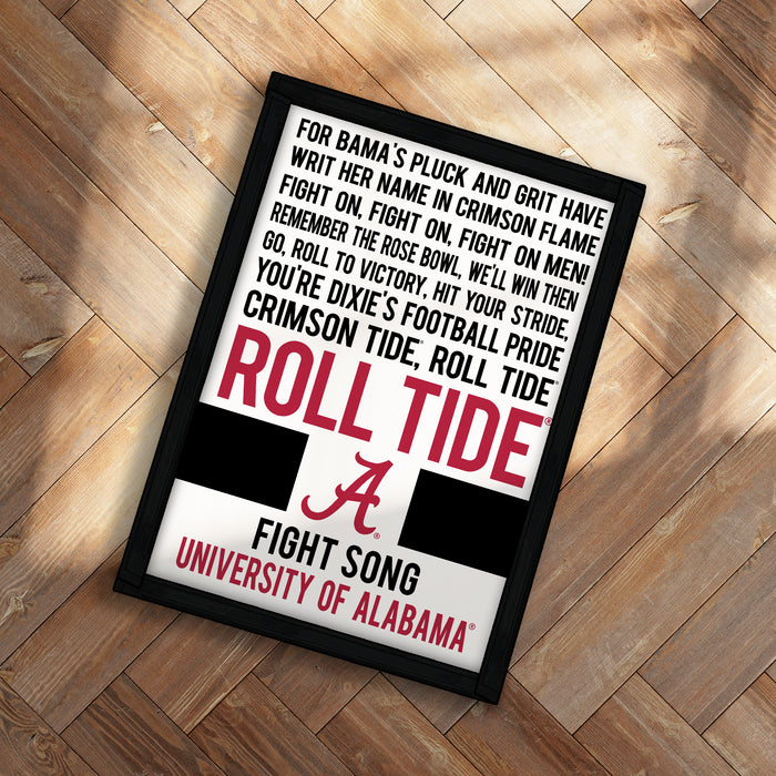 The image is a framed poster with text that reads "For Bama's Pluck and grit have WRIT HER NAME IN AND GRIT HAVE FIGHTED HER NAME IN CRIMSON FLAME REMEMBER ON FIGHT ON MEN GO ROLL TO VICTORY WE'LL WIN THEN YOU'RE DIXIES' FOOTBALL HIT YOUR STRIDE, CRIMSON TIDE, ROLL TIDE A FIGHTER SONG UNIVERSITY OF ALABAMA"