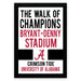 The image is a framed poster with text that reads "The walk of champions BRYANT-DENNY STADIUM A CRIMSON TIDE UNIVERSITY OF ALABAMA".