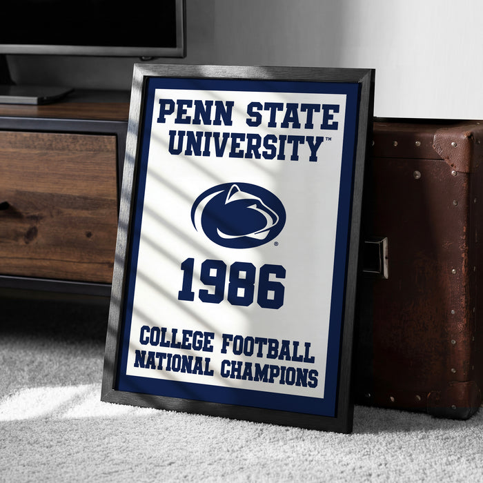 A framed poster celebrating the Penn State University's College Football National Champions from 1986, featuring the Penn State University logo and the text "College Football National Champions".