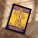 A framed poster featuring a cartoon tiger wearing a football uniform, with text indicating the Louisiana State University.