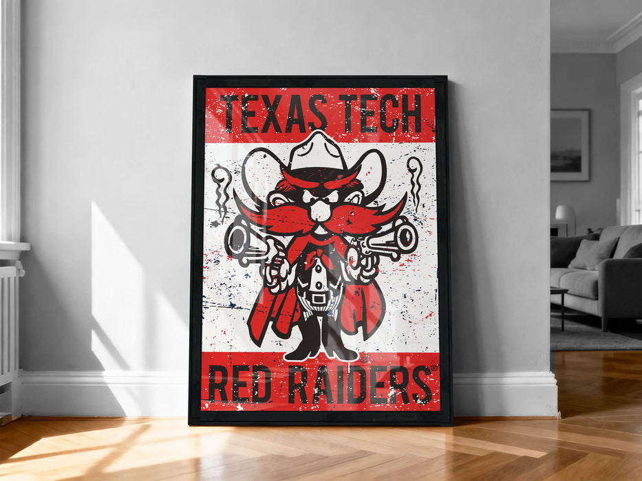 A framed poster featuring a cartoon character with a red beard and mustache, wearing a cowboy hat, and holding a gun. The poster has the text "TEXAS TECH RED RAIDERS" written on it.