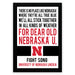 a framed quote that reads: "THERE IS NO PLACE LIKE NEBRASKA. WHERE THEY'RE ALL TRUE BLUE WE'LL ALL STICK TOGETHER IN ALL KINDS OF WEATHER FOR DEAR OLD NEBRASKA U. FIGHT SONG UNIVERSITY OF NEBRASKA LINCOLN"