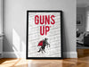 A framed poster with the text "GUNS UP" prominently displayed, along with a graphic of a person riding a horse.