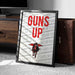 A framed poster with the text "GUNS UP" prominently displayed, featuring a graphic of a gun and a red bird.