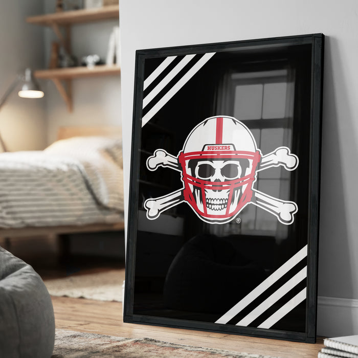 A framed poster featuring a skull wearing a football helmet with crossed bones, set against a black background with white stripes.