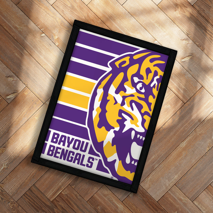 A framed poster featuring the logo of the Louisiana State University Football team, specifically the LSU Tigers.