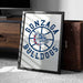 A framed poster with the Gonzaga Bulldogs logo is displayed on a carpeted floor next to a wooden chest.