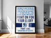 The image is a framed poster with text and a logo, placed on a wall in a room.