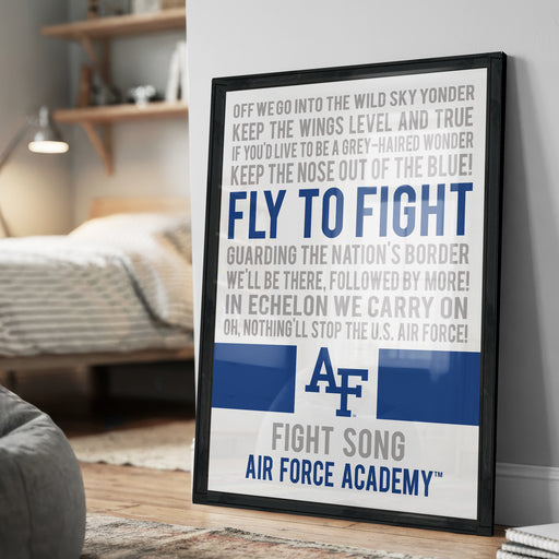 a framed poster with a message about the Air Force, including the words "Fly to fight" and "Guard the nation's border".