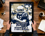 A framed poster of a football player in a navy uniform, with the text "NAVY FOOTBALL" prominently displayed.