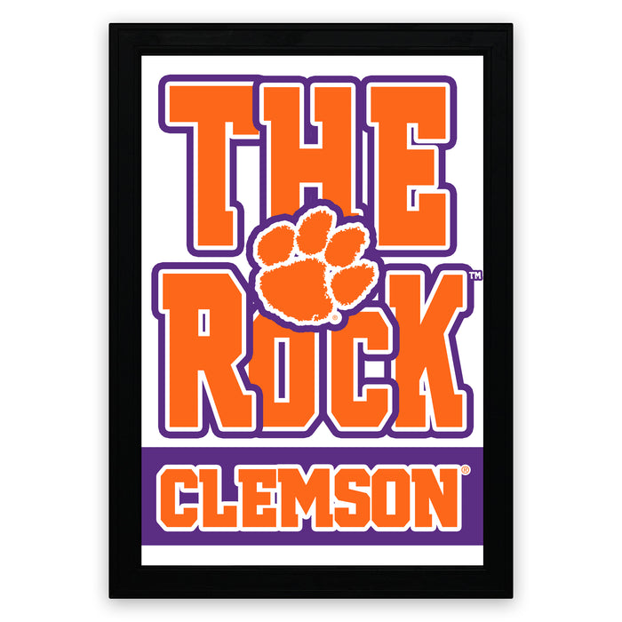 The image is a framed poster featuring the logo and name of the college football team, The Rock, which is associated with the University of South Carolina.
