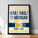 The image is a framed poster with text that reads "Hail! to the victors' champion! to michigan! the champions of the west! fight song university of michigan".