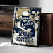 A framed poster featuring a football player in a navy uniform, with the text "NAVY FOOTBALL" prominently displayed.