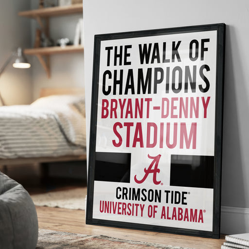 The image is a framed poster advertising "The Walk of Champions" at the Bryant-Denny Stadium, featuring the University of Alabama logo.