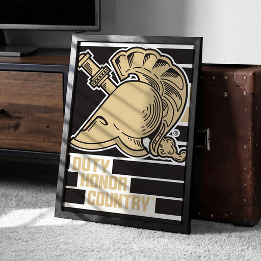 A framed poster with a graphic design featuring a helmet and the text "DUTY Honor Country" is displayed on a carpeted floor next to a wooden chest.