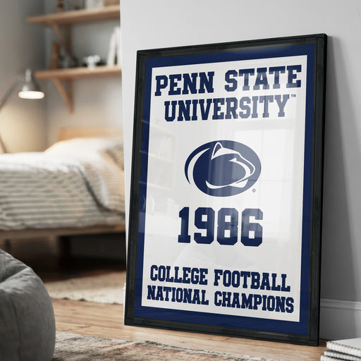 A framed poster on a wall celebrating the Penn State University's College Football National Champions from 1986.