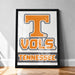 A framed poster with the word "TENNESSEE" and the logo of the University of Tennessee, which is the home of the University of Tennessee basketball team.