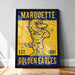 A framed poster featuring a cartoon eagle with the text "MARQUETTE EST. 1881 GOLDEN EAGLES" on it.