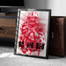 A framed poster featuring a red football player with the text "GO BIG RED" and "Nebraska Cornhuskers" printed on it.