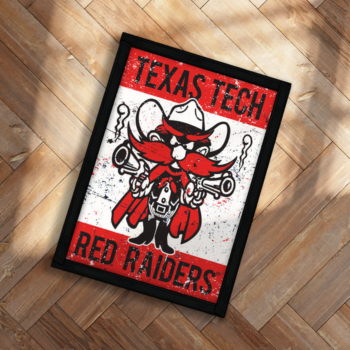 A framed poster featuring a cartoon character with a cowboy hat and mustache, representing the Texas Tech Red Raiders.