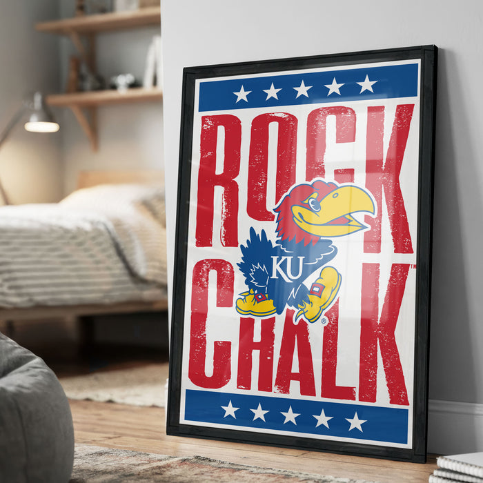 A framed poster featuring the text "ROCK CHALK" and an illustration of a bird, likely representing a sports team.