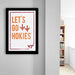 a framed poster with the text "LET'S GO HOKIES" and a Virginia Tech logo, hanging on a wall.