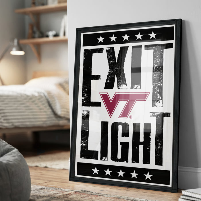 A framed poster with the text "EXIT LIGHT" and a Virginia Tech (VT) logo, displayed on a wall in a bedroom.