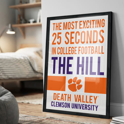 The image is a framed poster with text that reads "The most exciting 25 seconds in college football The Hill Death Valley Clemson University".
