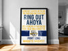 a framed poster with text and logos related to Marquette University, including the university's name and a slogan about fighting for old Marquette University.