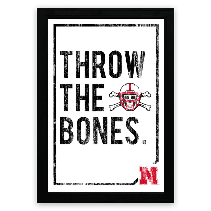 The image is a framed poster with the text "THROW THE BONES" and a skull and crossbones symbol.