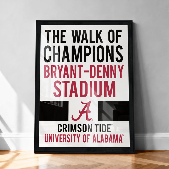 The image is a framed poster with text that reads "The walk of champions BRYANT-DENNY STADIUM A CRIMSON TIDE UNIVERSITY OF ALABAMA".