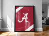 A framed poster with the letter "A" on it, displayed on a wall in a room.