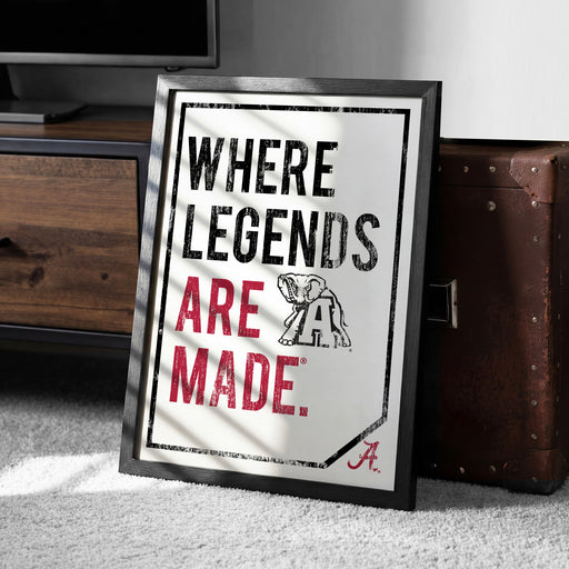 A framed poster with the text "WHERE LEGENDS ARE MADE" and an illustration of an elephant.