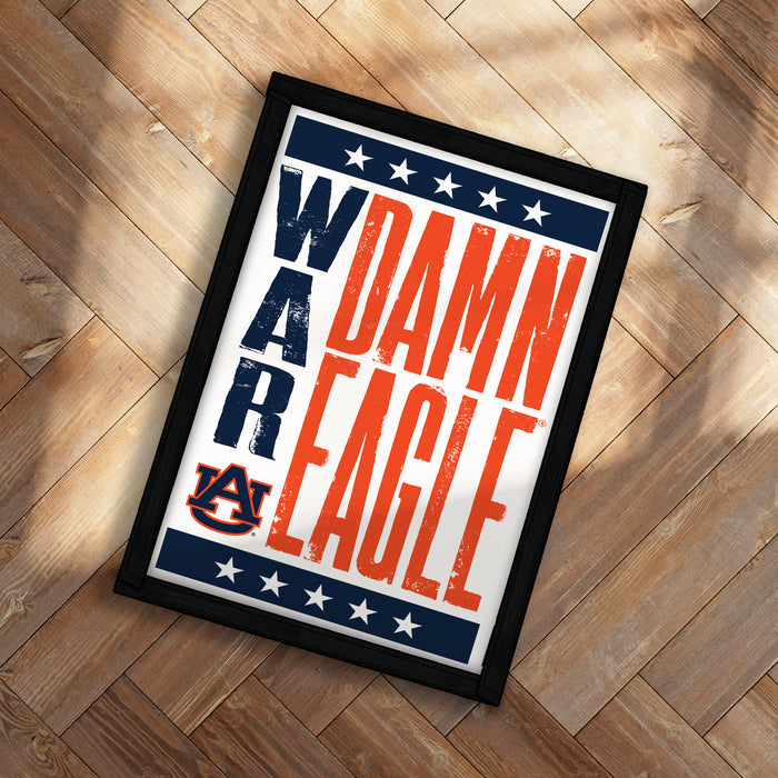 A framed poster with the text "WAR DAMN EAGLE" in bold, orange and blue letters, with the word "AUBURN" in a smaller font below.