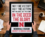 a framed quote from the University of Nebraska Lincoln, which reads "NOT THE VICTORY BUT THE ACTION NOT THE GOAL BUT THE GAME IN THE DEED THE GLORY. MEMORIAL STADIUM UNIVERSITY OF NEBRASKA LINCOLN".