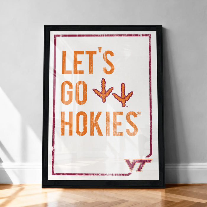 A framed poster with the text "LET'S GO HOKIES" and two orange bird silhouettes, likely representing the Virginia Tech Hokies football team.