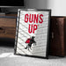 A framed poster with the text "GUNS UP" prominently displayed, along with a graphic of a person riding a horse. The poster is placed on a carpeted floor next to a wooden dresser.