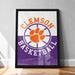 A framed poster with the text "CLEMSON BASKETBALL" and an orange paw print symbol, indicating the team's logo.