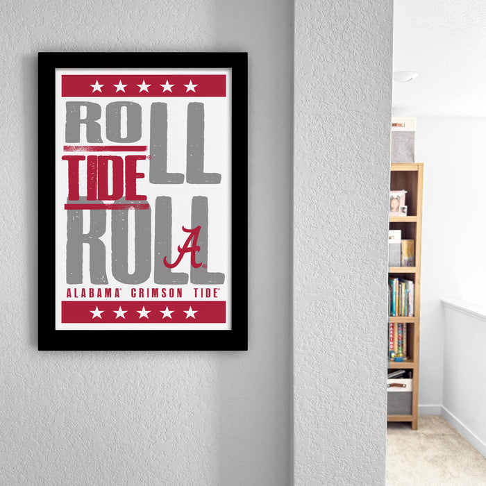 a framed poster with the text "ROLL TIDE ROL" and "ALABAMA CRIMSON TIDE" printed on it, hanging on a wall.