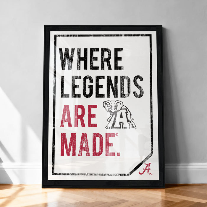 A framed poster with the text "WHERE LEGENDS ARE MADE." and an illustration of an elephant.
