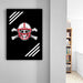 a framed poster with a skull and crossbones design on a black background, hanging on a wall.