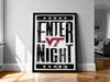 A framed poster with the text "ENTER NIGHT" and a Virginia Tech logo, displayed on a wall in a room.