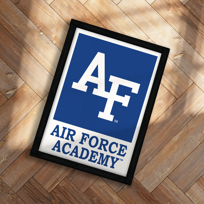 a framed sign with the logo of the Air Force Academy.