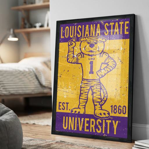 A framed poster of a tiger mascot from Louisiana State University, featuring the university's name and founding year.