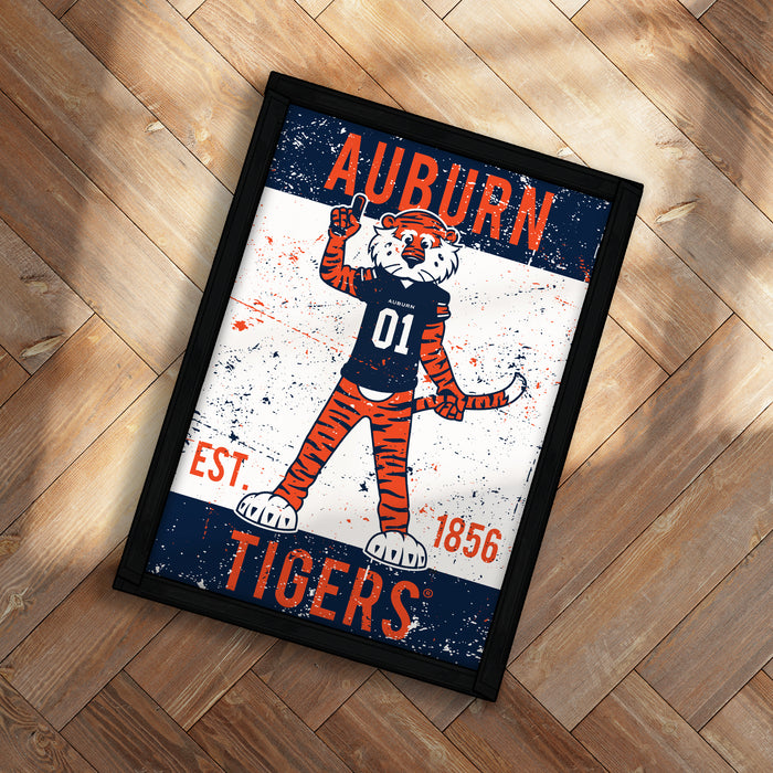 a framed poster of an illustration of a tiger mascot, representing the Auburn Tigers, with the text "Auburn" and "TIGERS" prominently displayed.