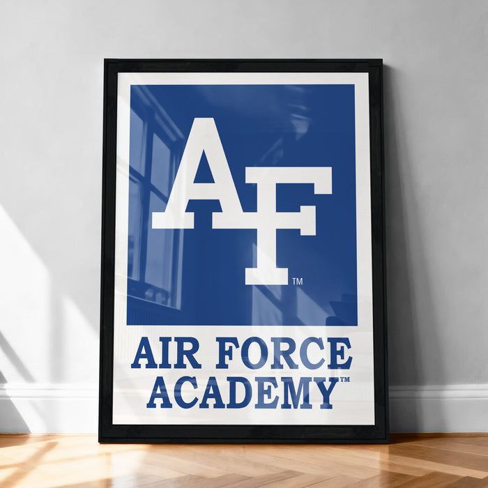 a framed poster with the logo of the Air Force Academy.