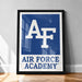 a framed poster with the logo of the Air Force Academy.