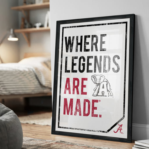 A framed poster with the text "WHERE LEGENDS ARE MADE" and an illustration of an elephant.
