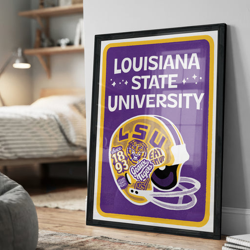 A framed poster of a football helmet with the text "LOUISIANA STATE UNIVERSITY" and "LOUISIANA TOUGHER" on it, along with various football-related graphics and text.
