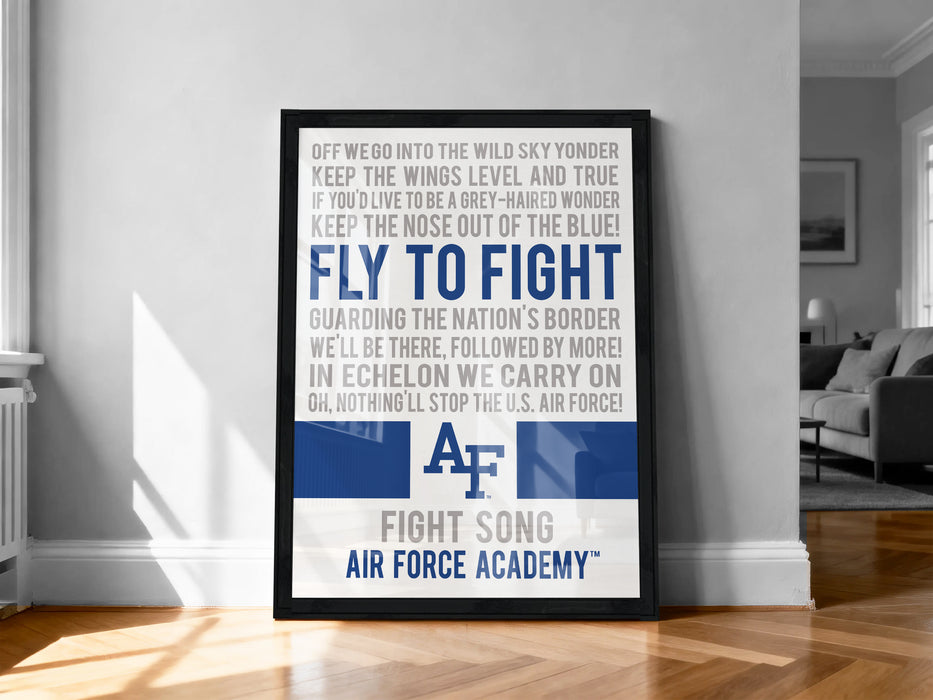 a framed poster with a motivational message from the Air Force, displayed on a wall in a room.